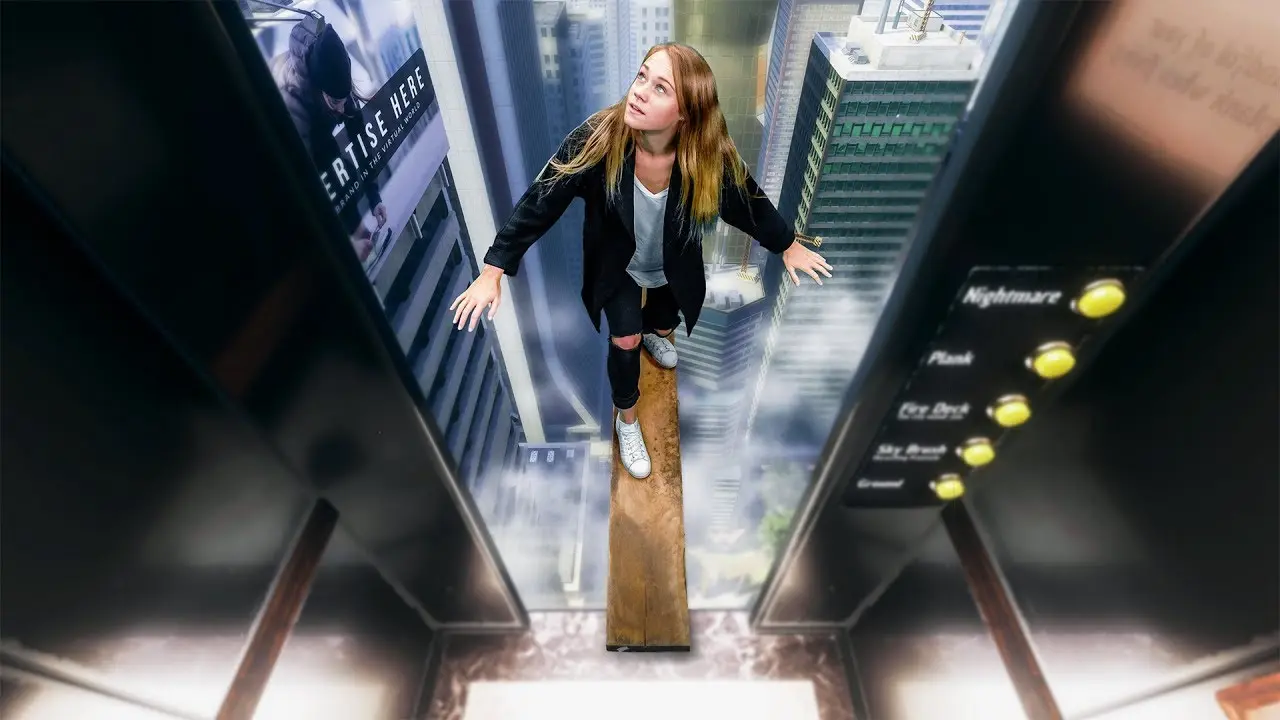Participant sur planche réelle face au vide en VR
